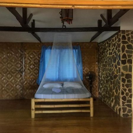 Beach House Resort And Dive Center Мамбахао Экстерьер фото