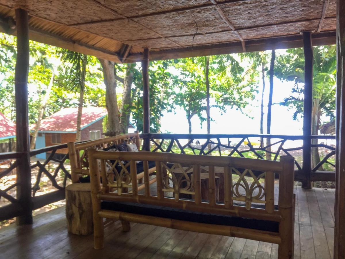 Beach House Resort And Dive Center Мамбахао Экстерьер фото