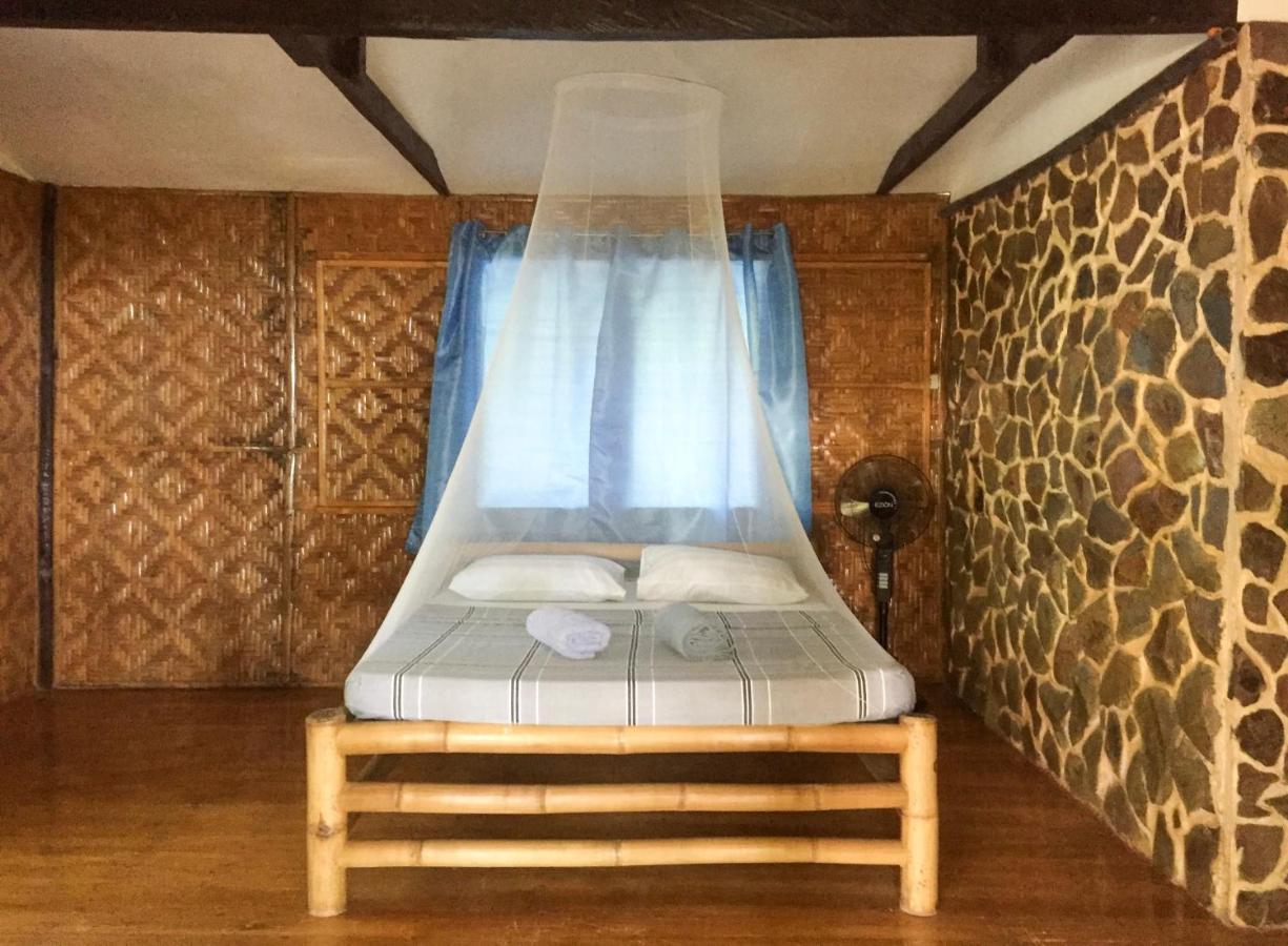 Beach House Resort And Dive Center Мамбахао Экстерьер фото