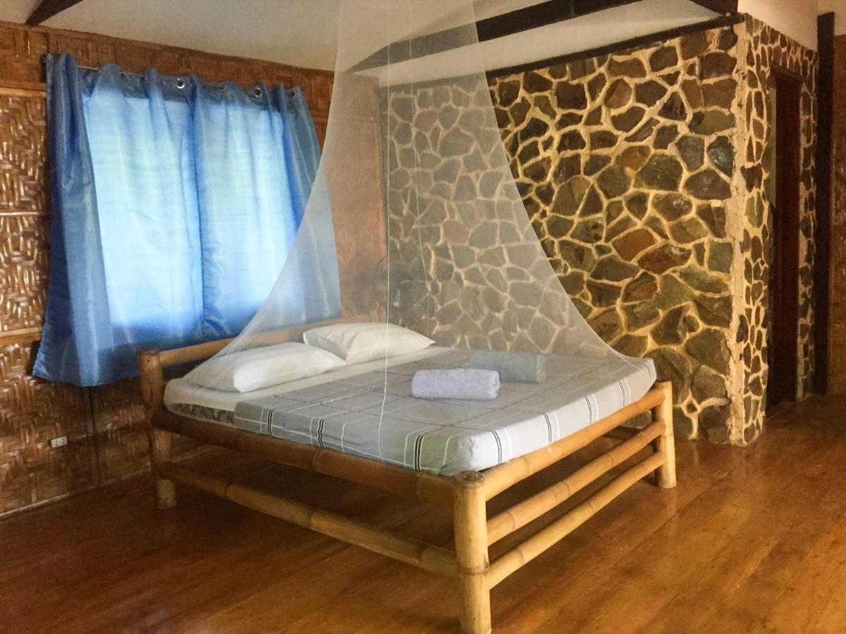 Beach House Resort And Dive Center Мамбахао Экстерьер фото